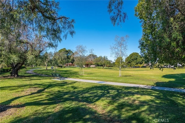 view of home's community featuring a lawn