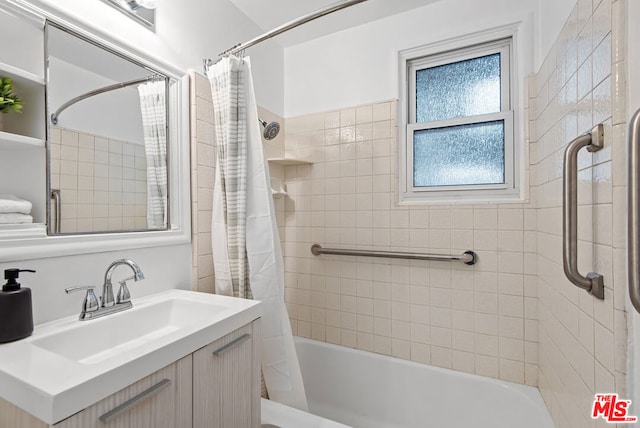 bathroom featuring vanity and shower / tub combo