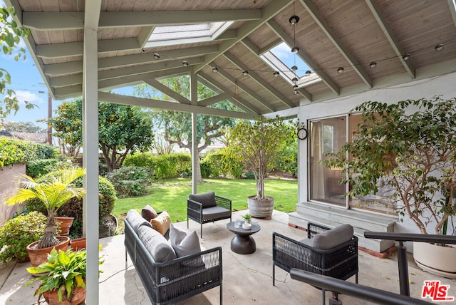 view of patio with an outdoor living space and a gazebo