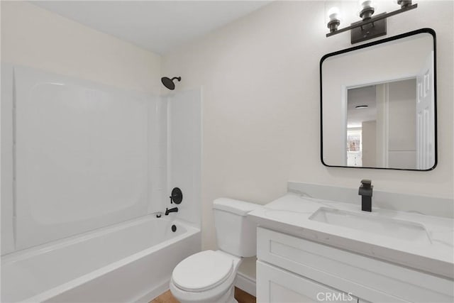 full bathroom featuring vanity, toilet, and shower / bath combination