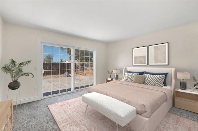 carpeted bedroom featuring access to exterior