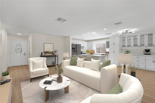 living room with light wood-type flooring