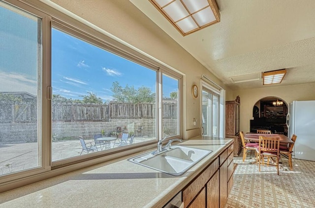 sunroom featuring sink