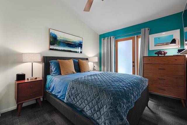 carpeted bedroom with vaulted ceiling and ceiling fan