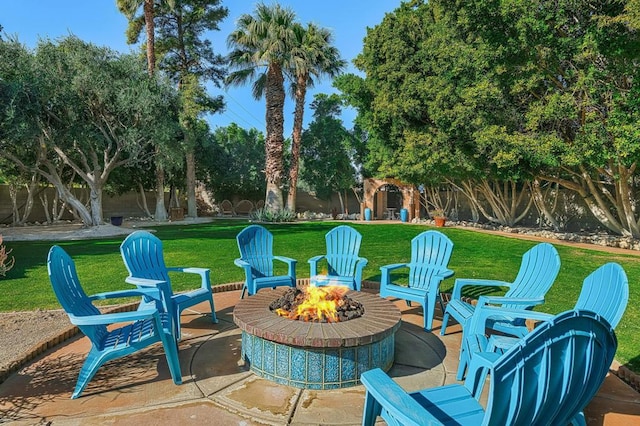 view of patio featuring a fire pit