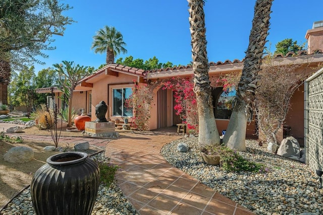 rear view of property with a patio area