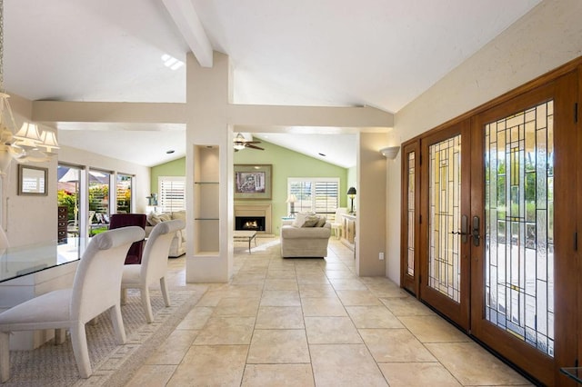 tiled entrance foyer with french doors and lofted ceiling with beams