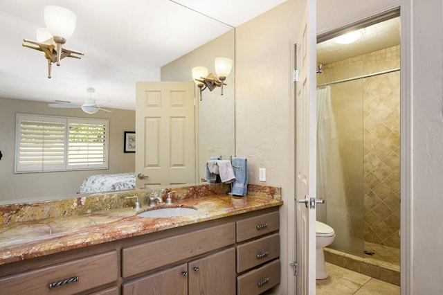 bathroom with vanity, toilet, tile patterned flooring, and a shower with curtain