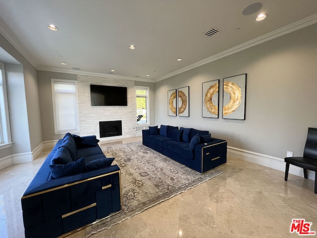 living room featuring crown molding and a fireplace