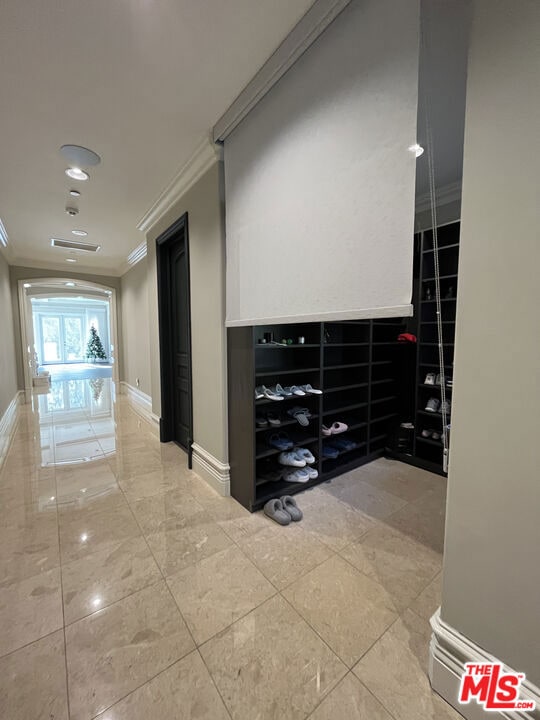 hallway with crown molding