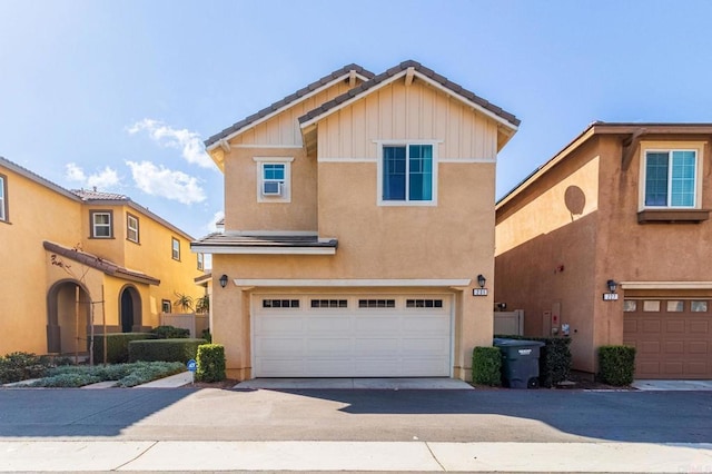 view of front of home with a garage