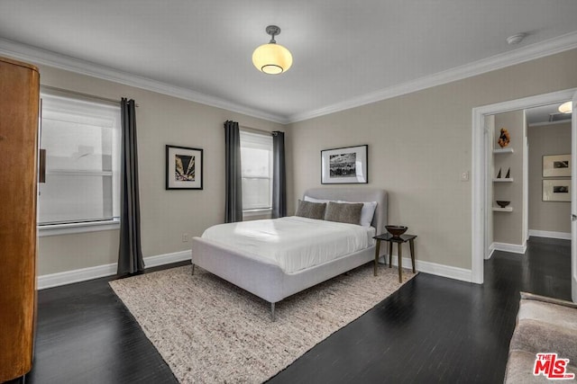 bedroom with crown molding and dark wood-type flooring