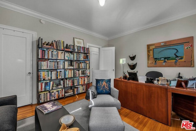 office area with crown molding and wood-type flooring