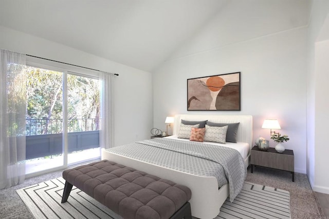 carpeted bedroom featuring vaulted ceiling and access to outside