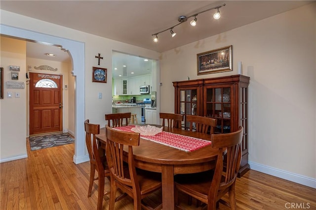 dining space featuring light hardwood / wood-style flooring