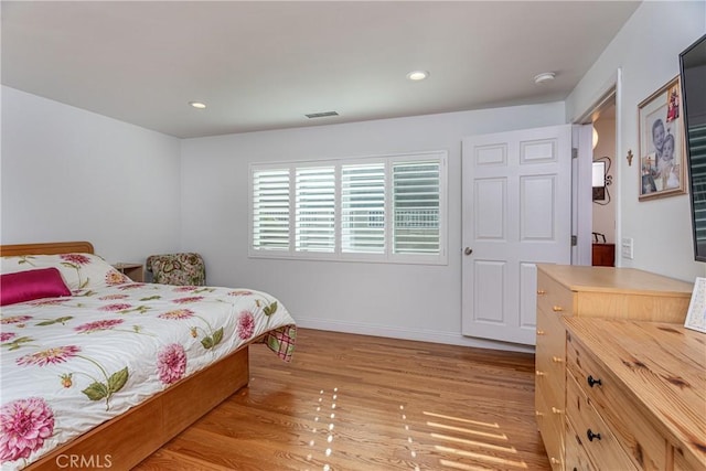 bedroom featuring light hardwood / wood-style flooring