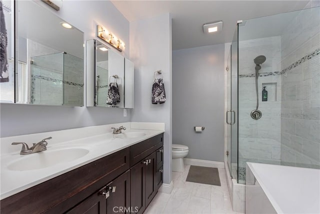 full bathroom featuring toilet, vanity, and shower with separate bathtub