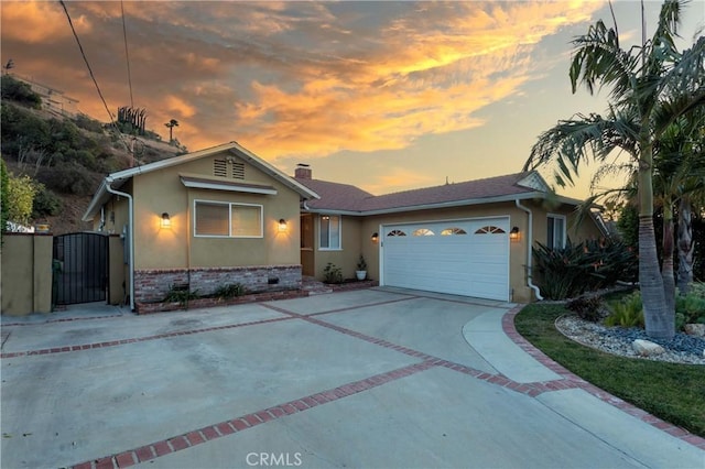 view of front of home with a garage