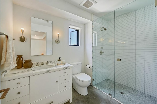 bathroom with concrete floors, toilet, an enclosed shower, and vanity