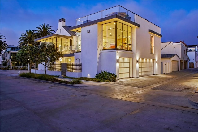 view of front of home with a garage