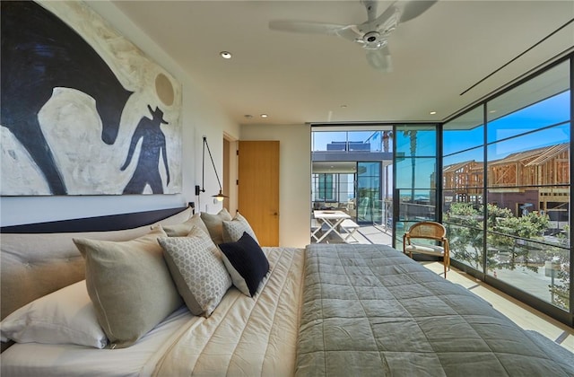 bedroom featuring access to exterior and expansive windows