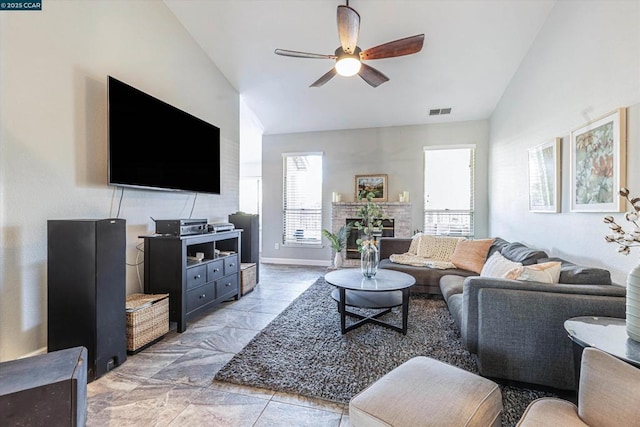 living room with lofted ceiling and ceiling fan