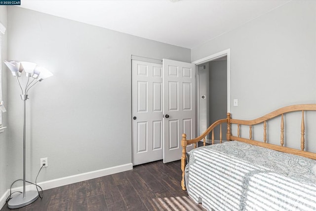 bedroom featuring dark hardwood / wood-style floors