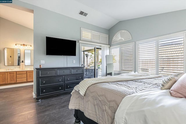 bedroom featuring ensuite bathroom, sink, vaulted ceiling, access to outside, and dark hardwood / wood-style floors