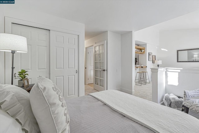 carpeted bedroom featuring a closet