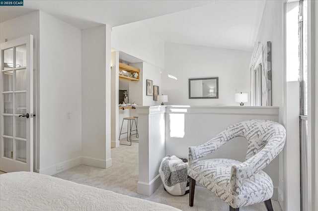 bedroom featuring light carpet