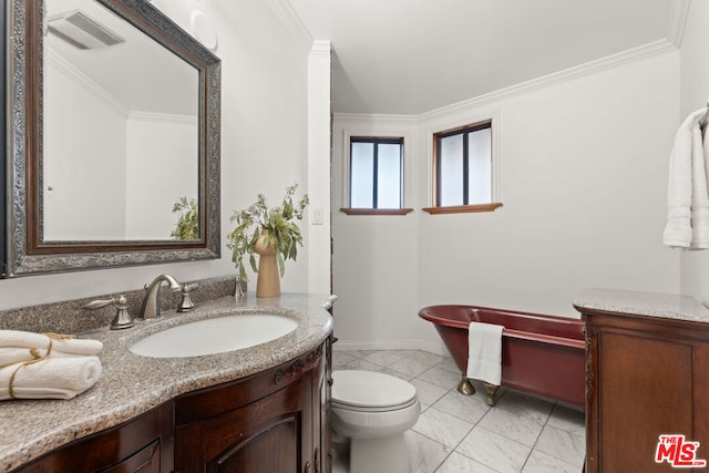 bathroom featuring ornamental molding, vanity, and toilet