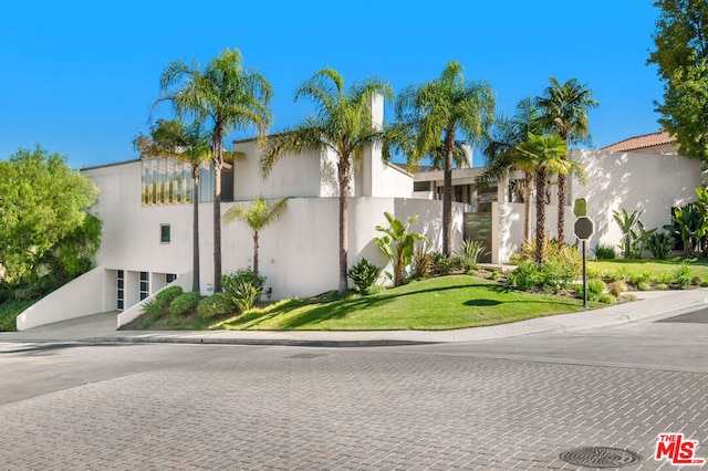 view of front of home with a front yard