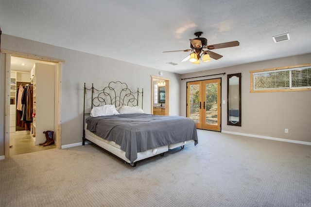 bedroom with ceiling fan, french doors, access to exterior, and light carpet