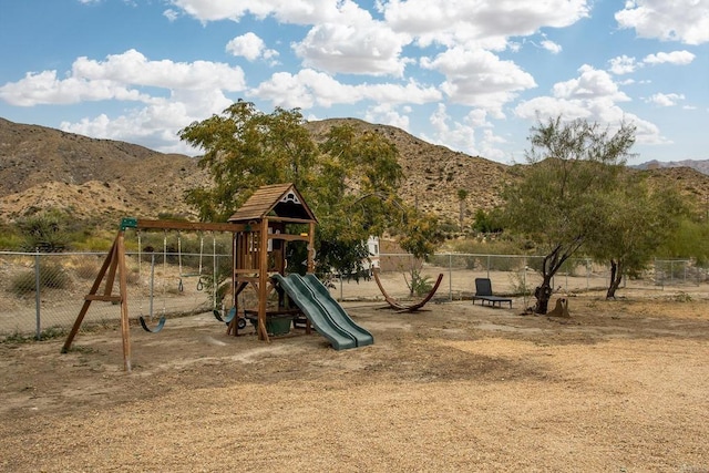 view of play area featuring a mountain view