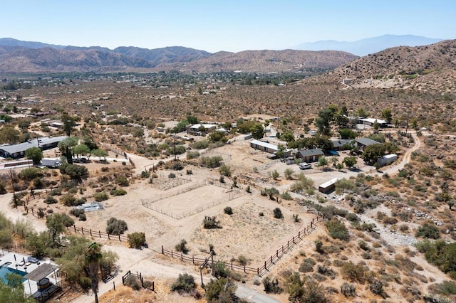 drone / aerial view featuring a mountain view