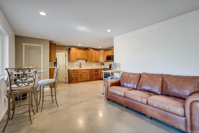 living room featuring sink