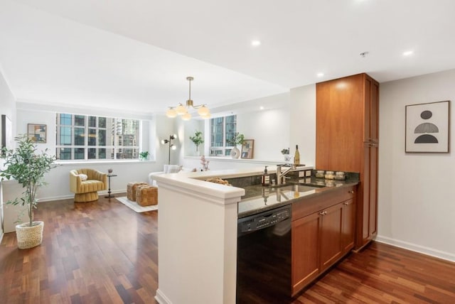 kitchen with sink, kitchen peninsula, dishwasher, and dark hardwood / wood-style flooring