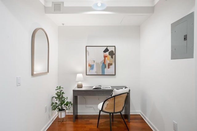 office space featuring hardwood / wood-style floors and electric panel