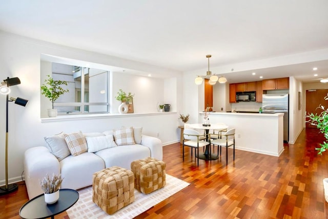 living room featuring dark wood-type flooring