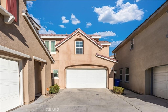 view of front of property featuring a garage