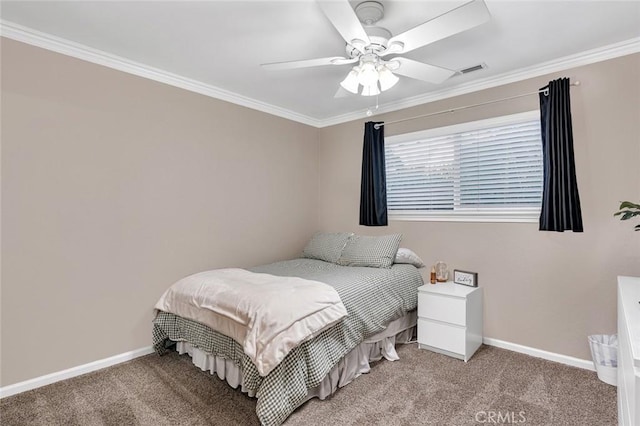 carpeted bedroom featuring ceiling fan and crown molding