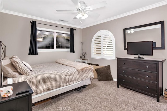 bedroom featuring ceiling fan, light colored carpet, and ornamental molding