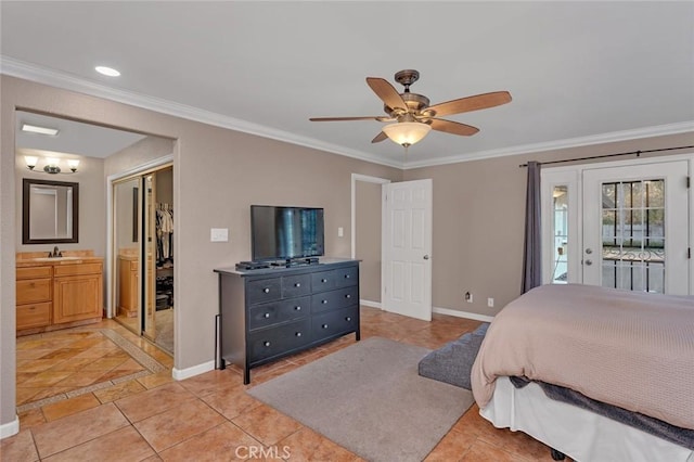 tiled bedroom featuring ceiling fan, access to outside, sink, ornamental molding, and connected bathroom