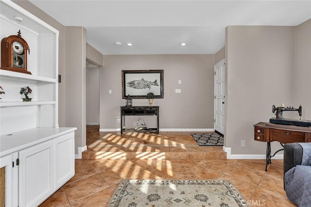 foyer entrance with light tile patterned flooring