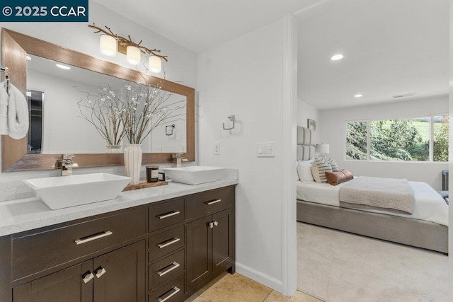 bathroom with vanity and tile patterned floors