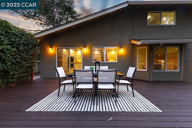 view of deck at dusk