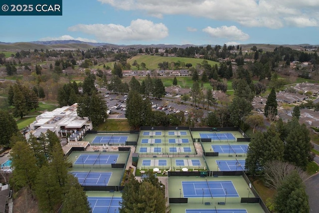 birds eye view of property featuring a mountain view