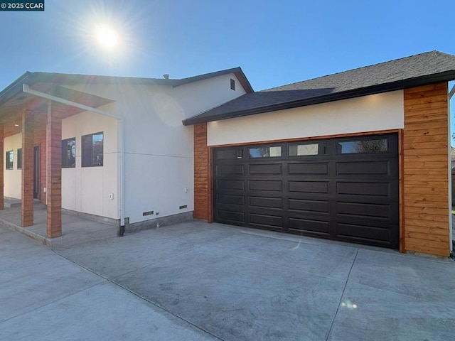 exterior space with a garage