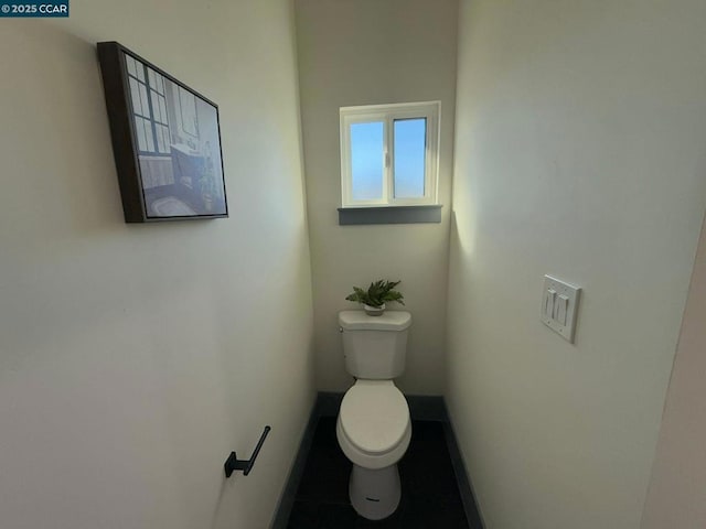 bathroom featuring toilet