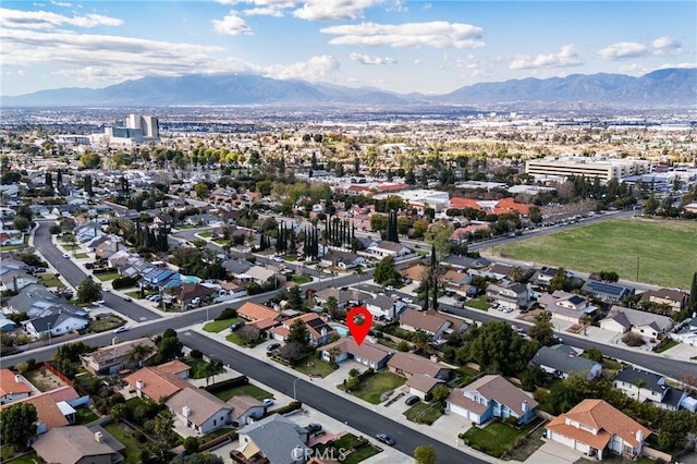 bird's eye view featuring a residential view and a mountain view